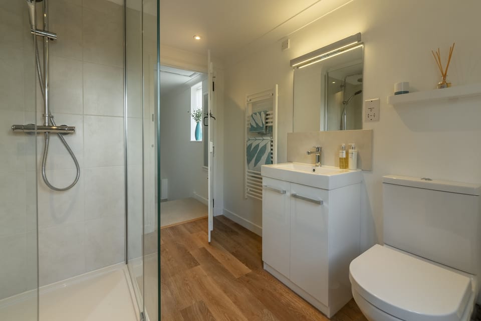 First floor: Family bathroom with walk-in rainfall shower