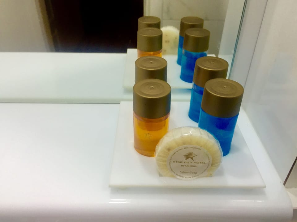 Shower, rainfall showerhead, free toiletries, hair dryer