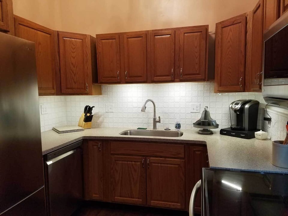 Fully equipped kitchen with microwave, dishwasher, oven and Keurig coffee maker