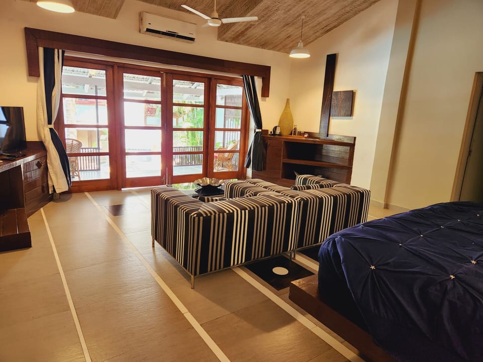 Casa Favourite | Living area | 32-inch LCD TV with satellite channels, TV