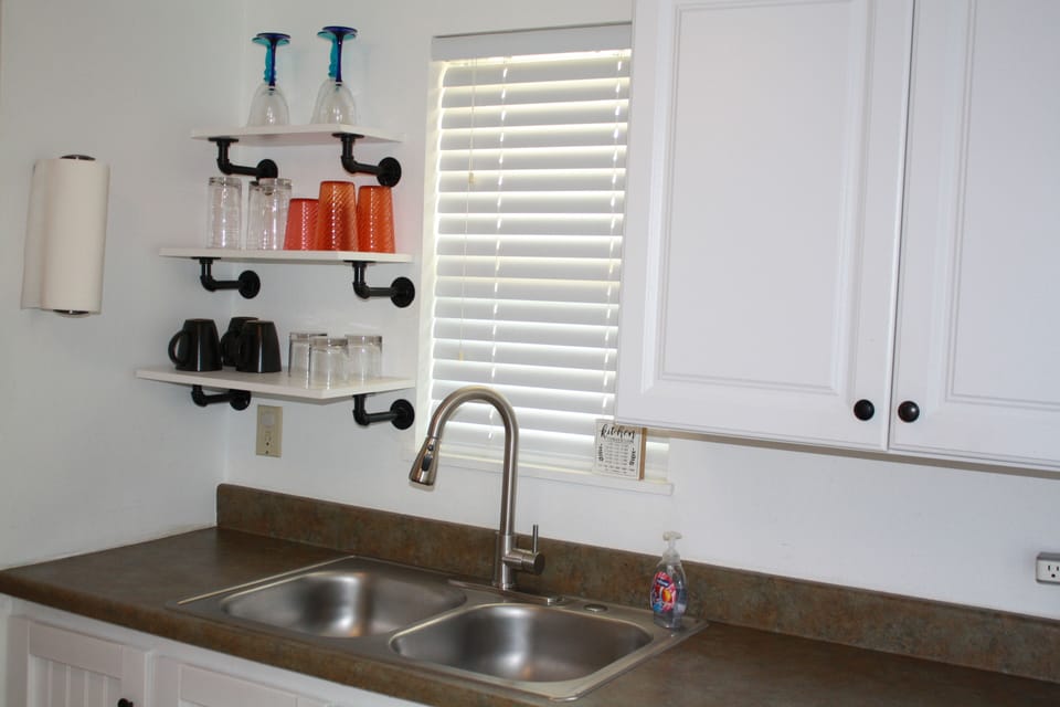 Kitchen sink with updated faucet