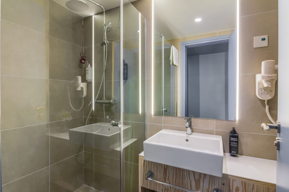 Eco-friendly toiletries, hair dryer, towels, soap