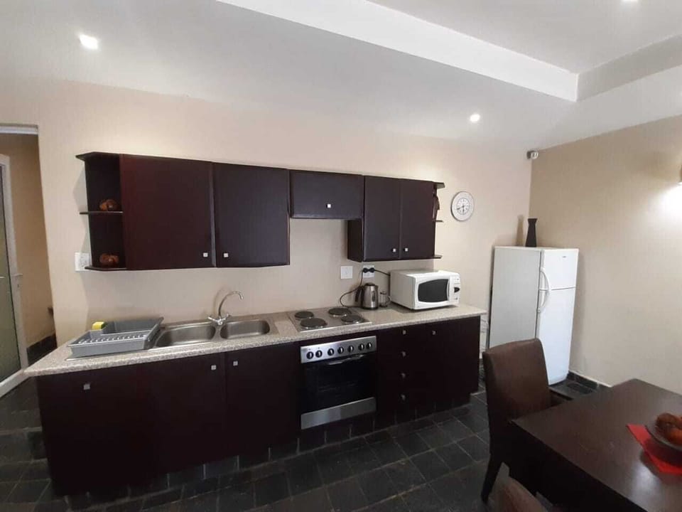 Deluxe Double Room (Self catering) | Private kitchen | Microwave, electric kettle
