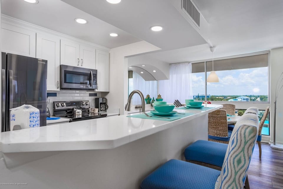 The granite counter accommodates seating for two.