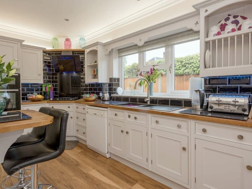 Luxury Villa | Private kitchen | Full-size fridge, microwave, oven, stovetop