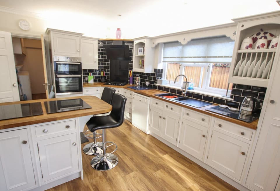 Luxury Villa | Private kitchen | Full-size fridge, microwave, oven, stovetop
