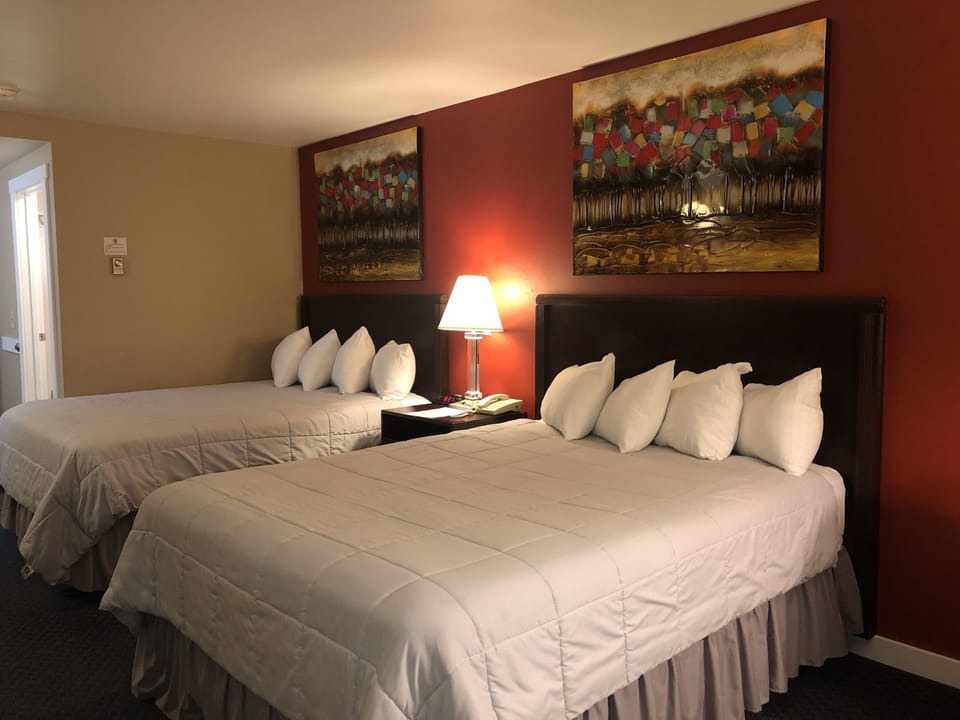 Standard Room, 2 Queen Beds | 20 bedrooms, individually furnished, desk, laptop workspace