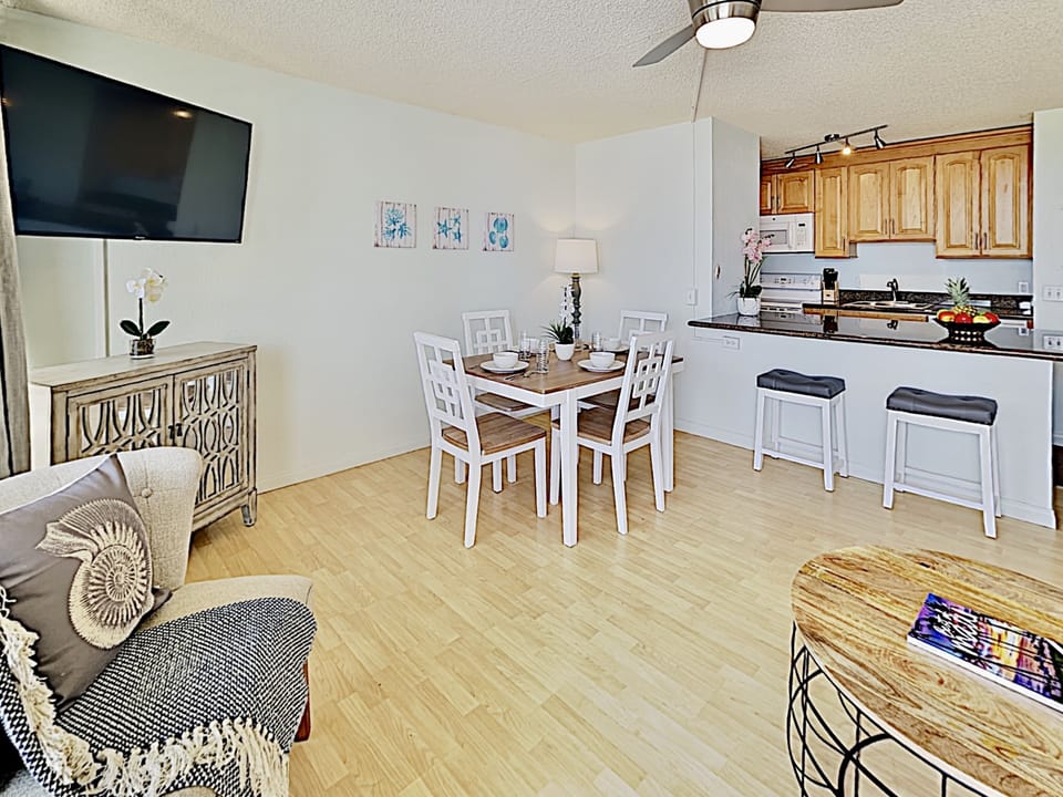 Living Room - Enjoy serving your guests at the kitchen countertop with bar seating for two