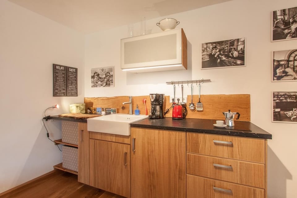Full-size fridge, stovetop, coffee/tea maker, electric kettle