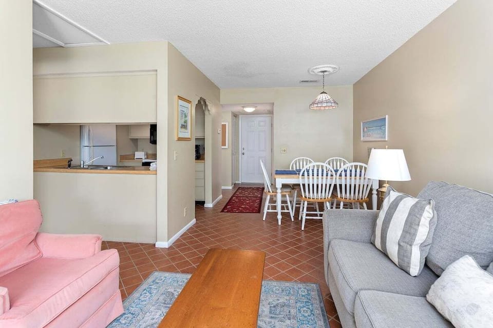 Shipwatch 312 - Living room area with access to entry door