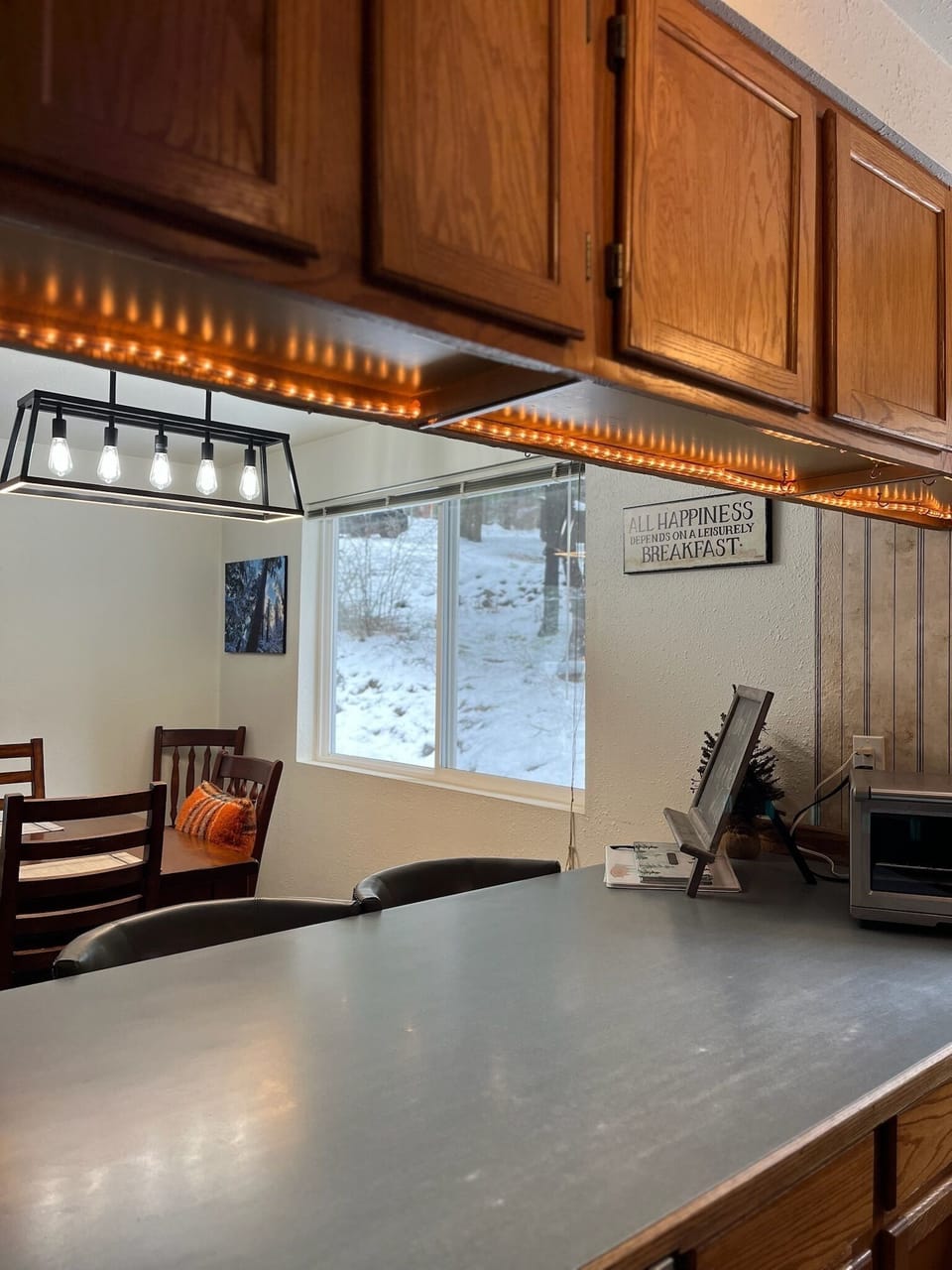 Countertop seats 4 barstools. Toaster oven.
