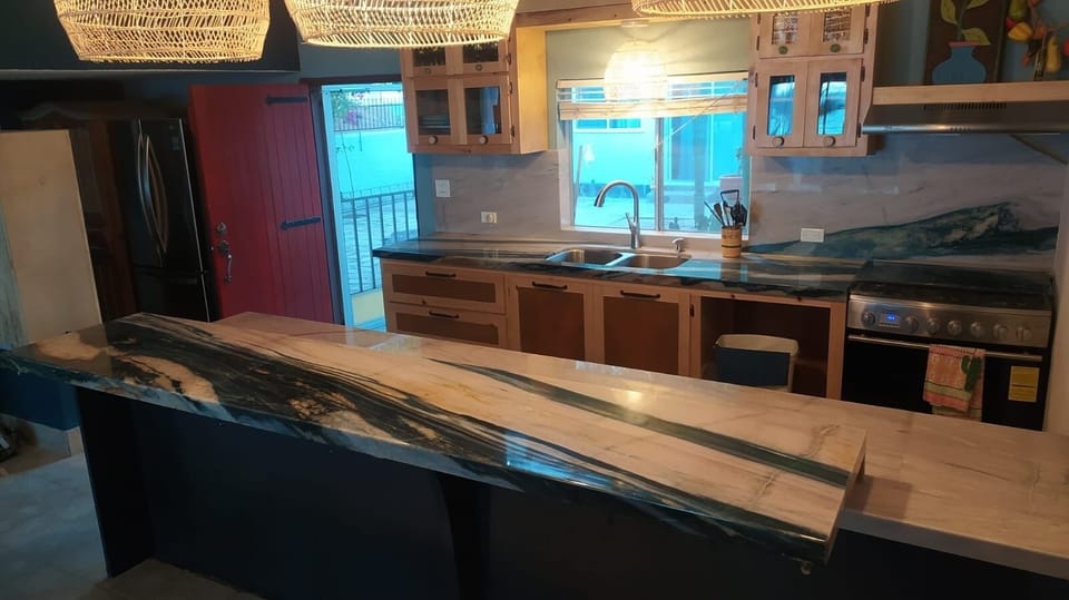 Our new kitchen with new appliances and stone countertops.