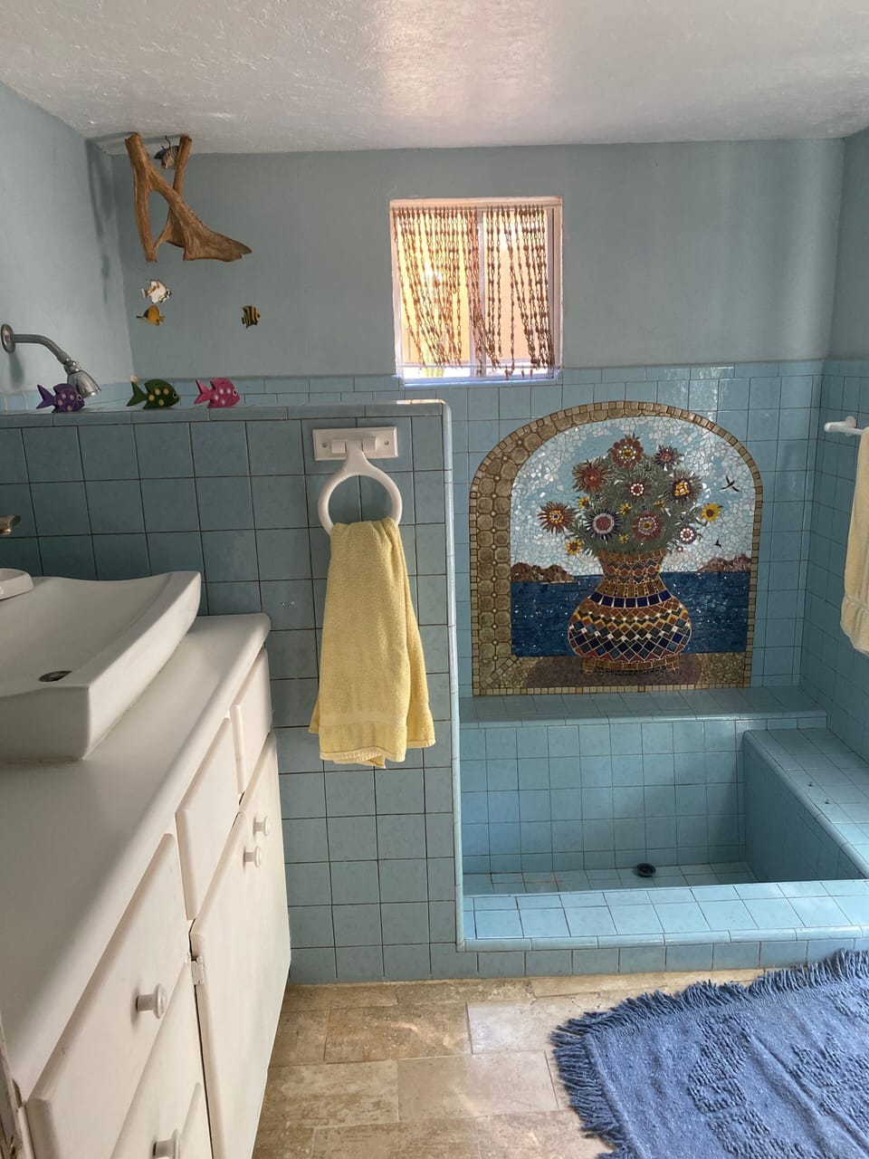 Full bath next to kitchen for upstairs casita and guest bath.