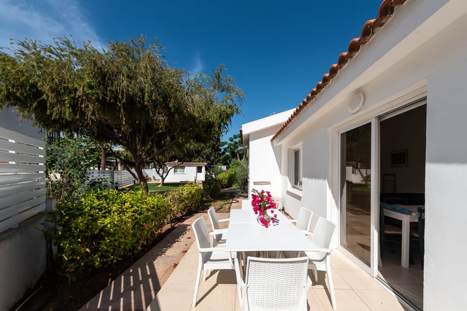 Patio area with dining furniture