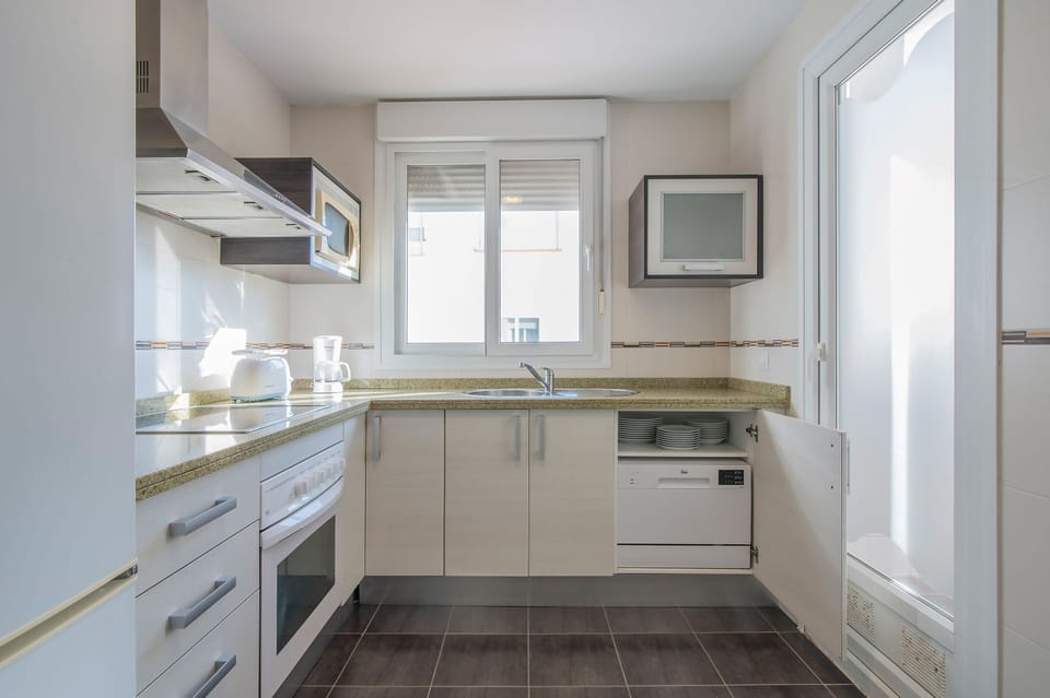 Standard Apartment, 3 Bedrooms, Balcony | Private kitchen | Full-size fridge, microwave, stovetop, coffee/tea maker