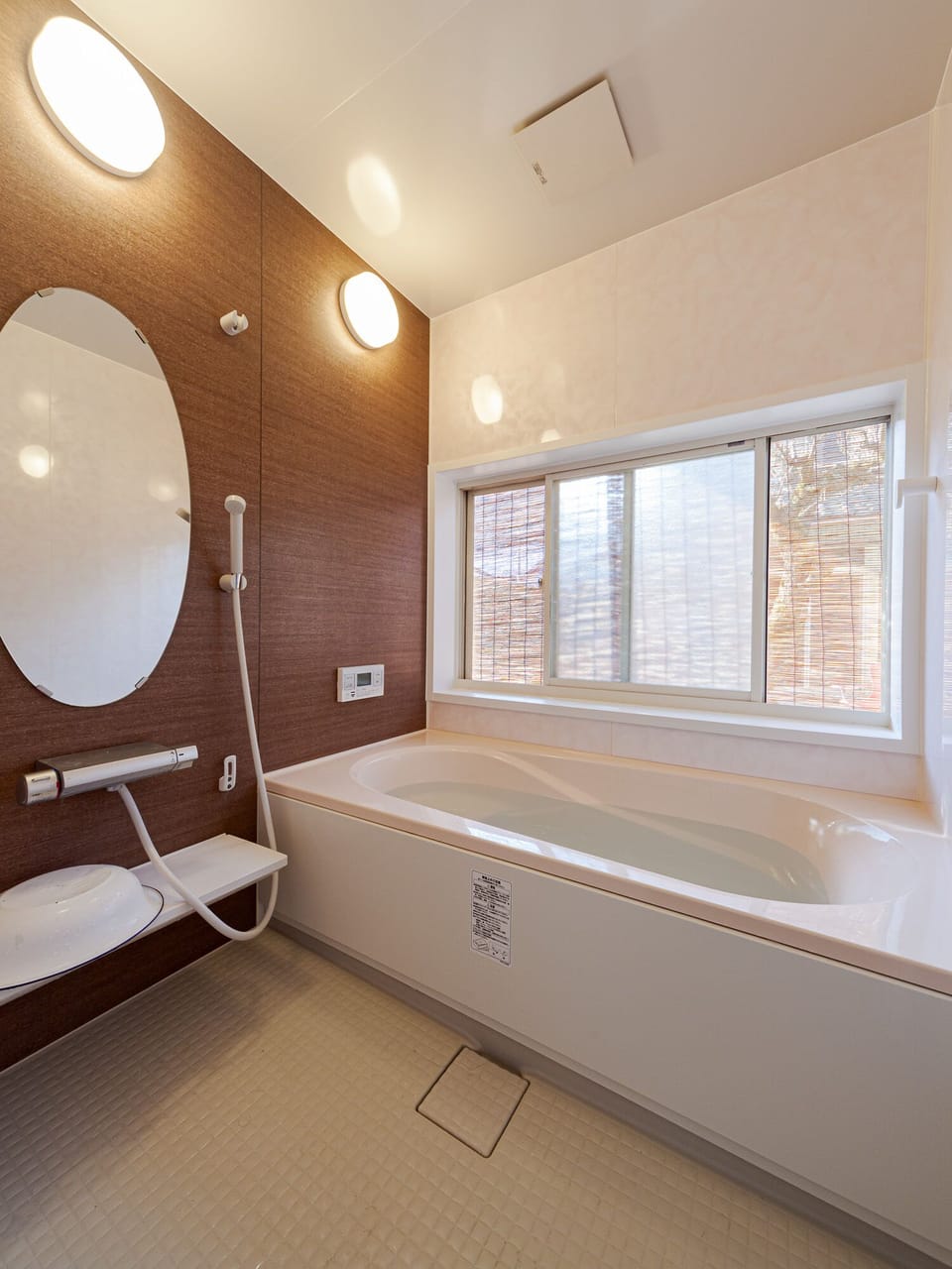 Deep soaking tub, rainfall showerhead, hair dryer, slippers