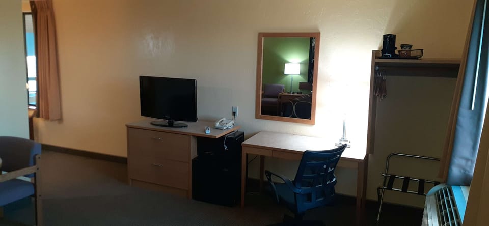 Suite, 1 Queen Bed, Non Smoking, Refrigerator & Microwave (Separate Living Room;with Sofabed) | Desk, laptop workspace, blackout drapes, iron/ironing board