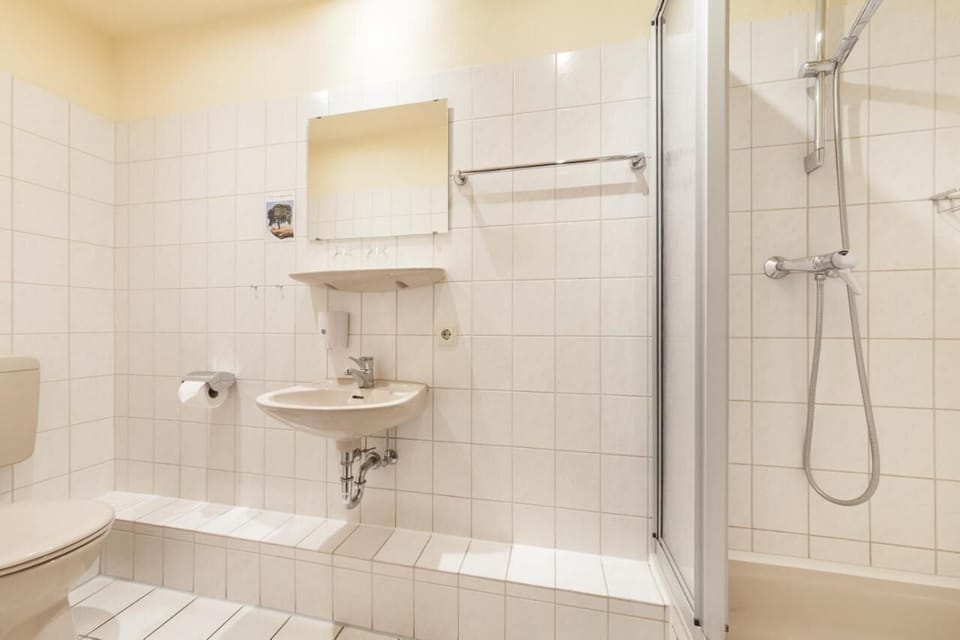 Shower, free toiletries, hair dryer, towels