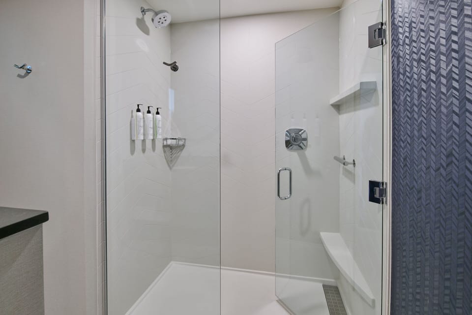 Rainfall showerhead, free toiletries, hair dryer, towels