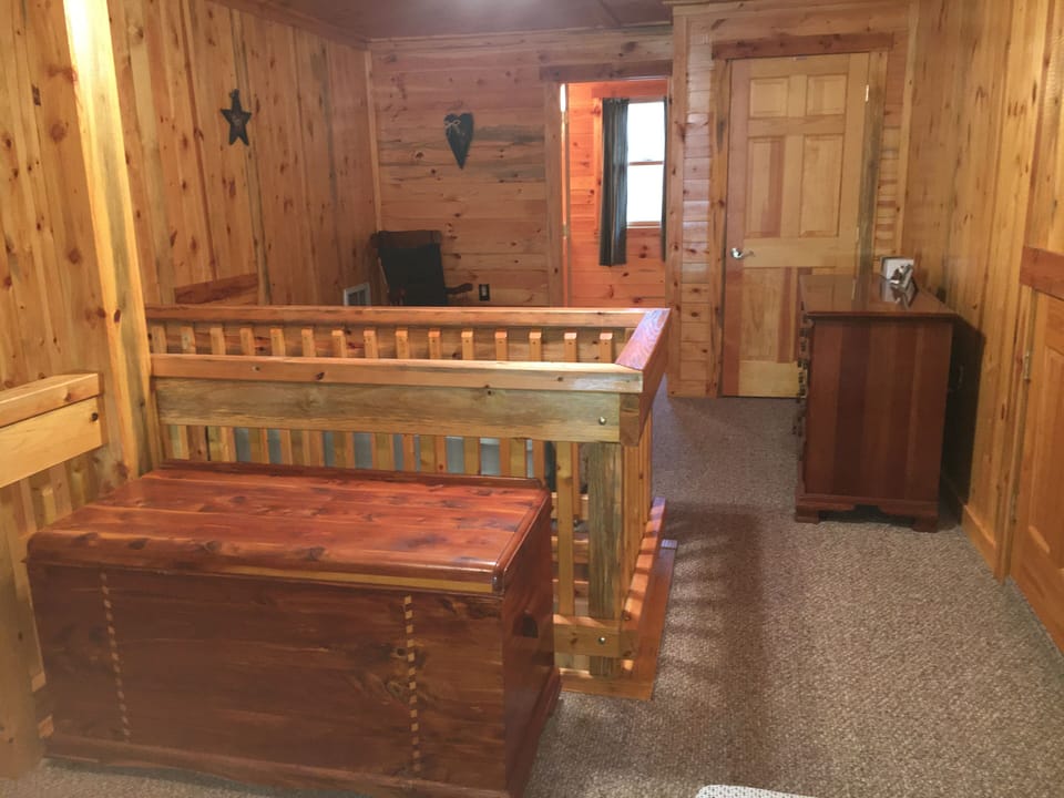 Bedroom 2: loft area with queen bed and twin mattress