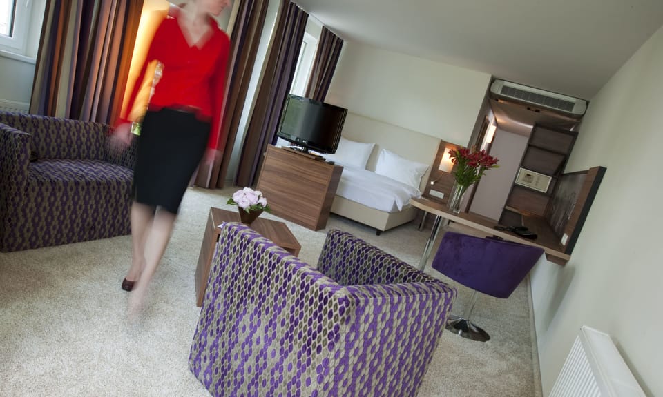 Superior Double Room | Living area | Flat-screen TV