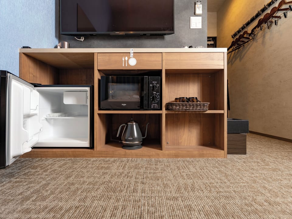 Standard Quadruple Room with Loft | Desk, blackout drapes, soundproofing, iron/ironing board