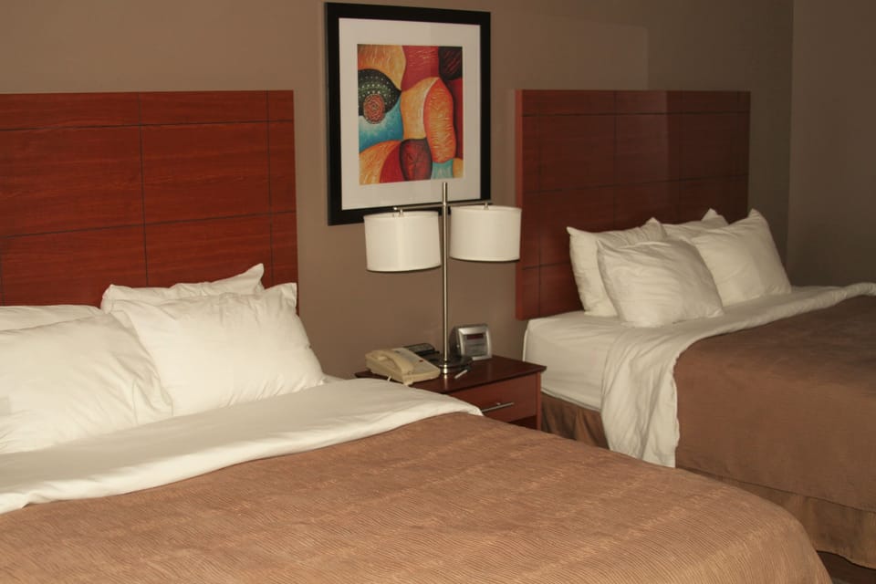 Standard Room, 2 Queen Beds, Non Smoking | In-room safe, desk, iron/ironing board, free WiFi