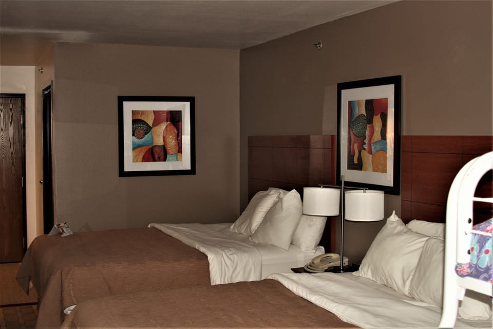 Standard Room, Multiple Beds, Non Smoking | In-room safe, desk, iron/ironing board, free WiFi