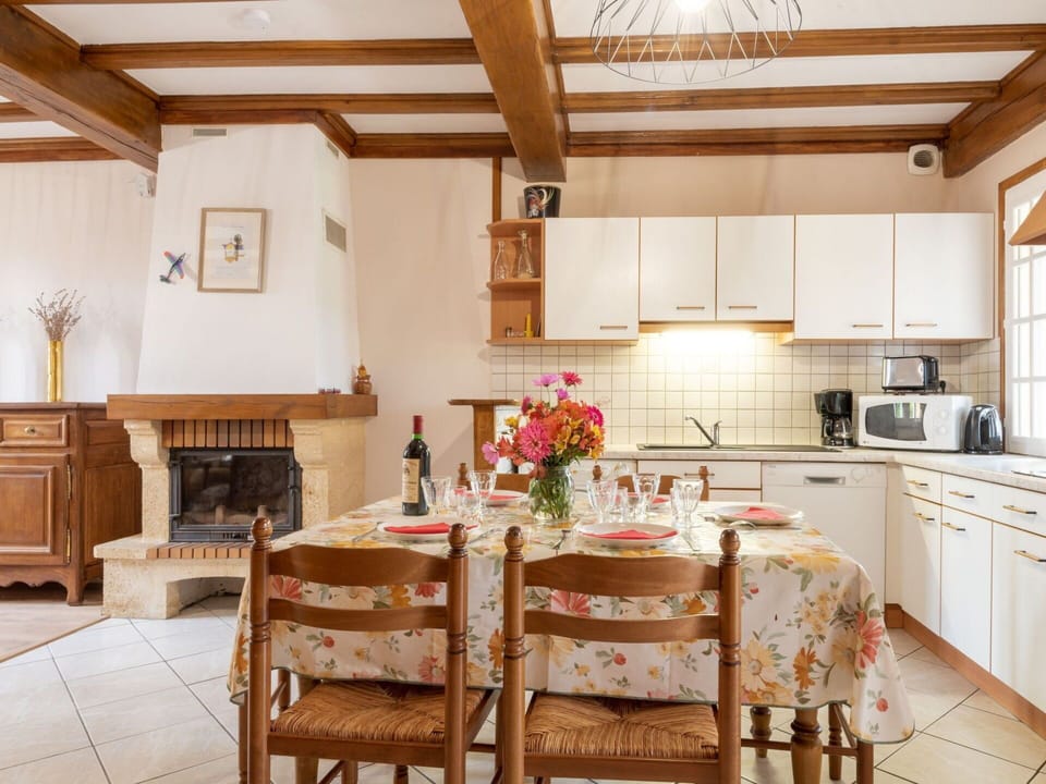Cabinetry, Furniture, Wood, Table, Flower, Countertop, Chair, Floor, Kitchen, Flooring