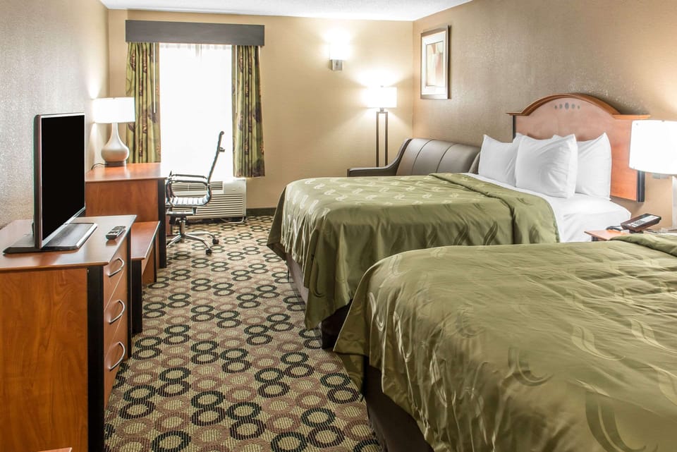 Pillowtop beds, desk, laptop workspace, blackout drapes