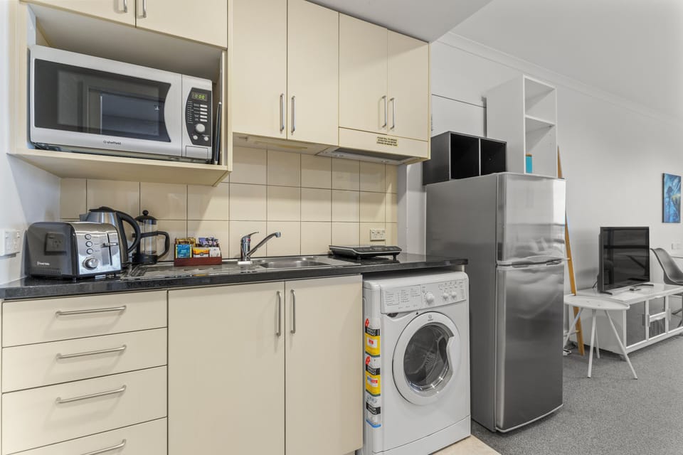 Studio | Private kitchen | Full-size fridge, microwave, electric kettle, toaster