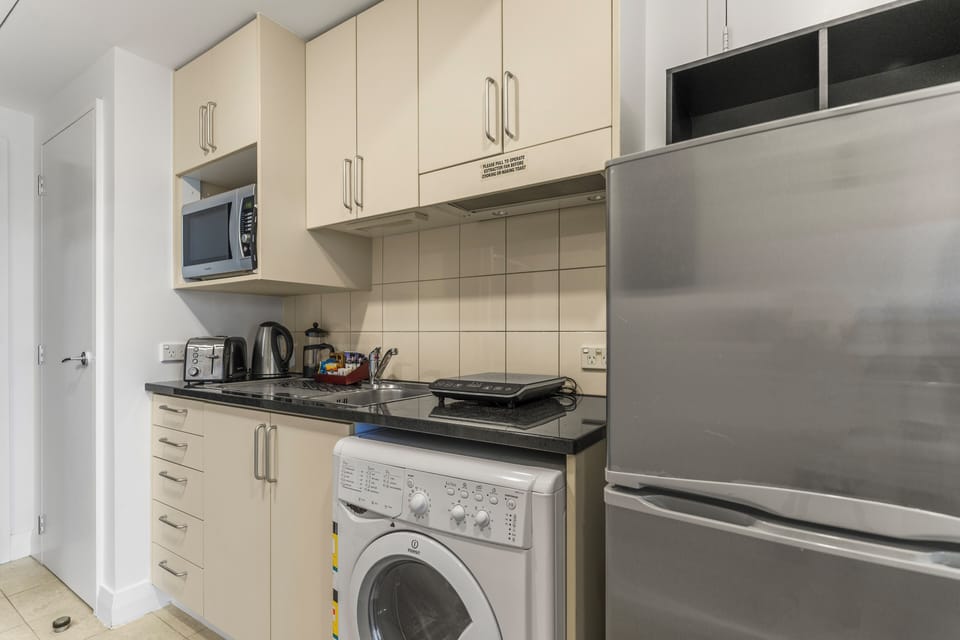 Studio | Private kitchen | Full-size fridge, microwave, electric kettle, toaster
