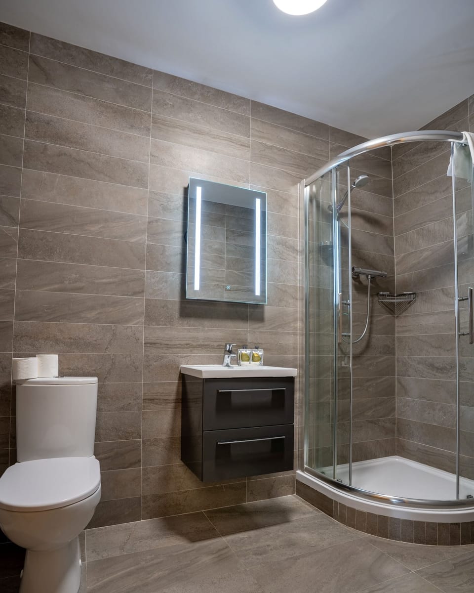 Shower, free toiletries, hair dryer, towels