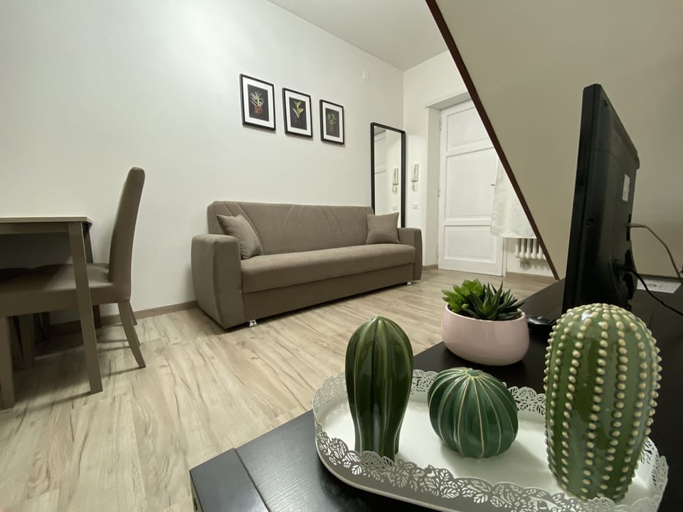 Apartment, 1 Double Bed with Sofa bed, Garden Area | Living room | 32-inch LED TV with cable channels, TV