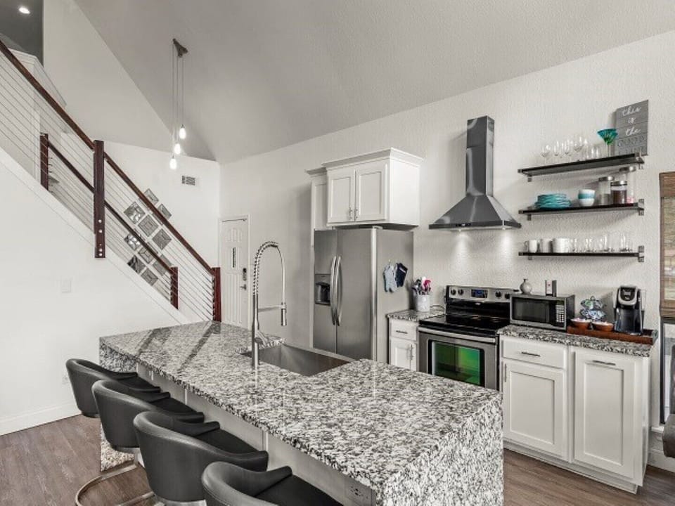 Kitchen with waterfall countertops
