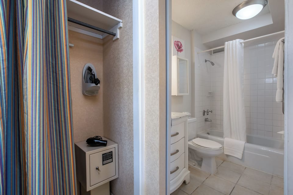 Suite, 1 Bedroom (FREE extra person) | Bathroom | Free toiletries, hair dryer, towels, soap