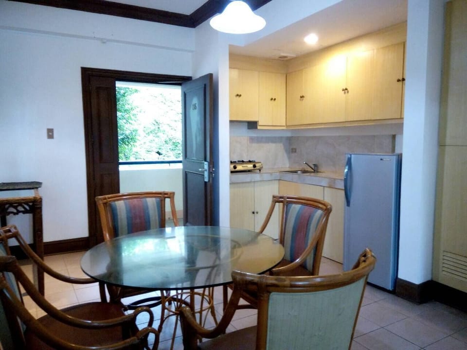 1 BR Apartment | Private kitchenette | Full-size fridge, stovetop, rice cooker, cookware/dishes/utensils