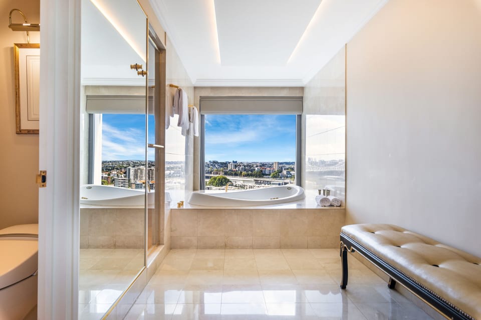 Stamford Suite | Bathroom | Designer toiletries, hair dryer, slippers, towels