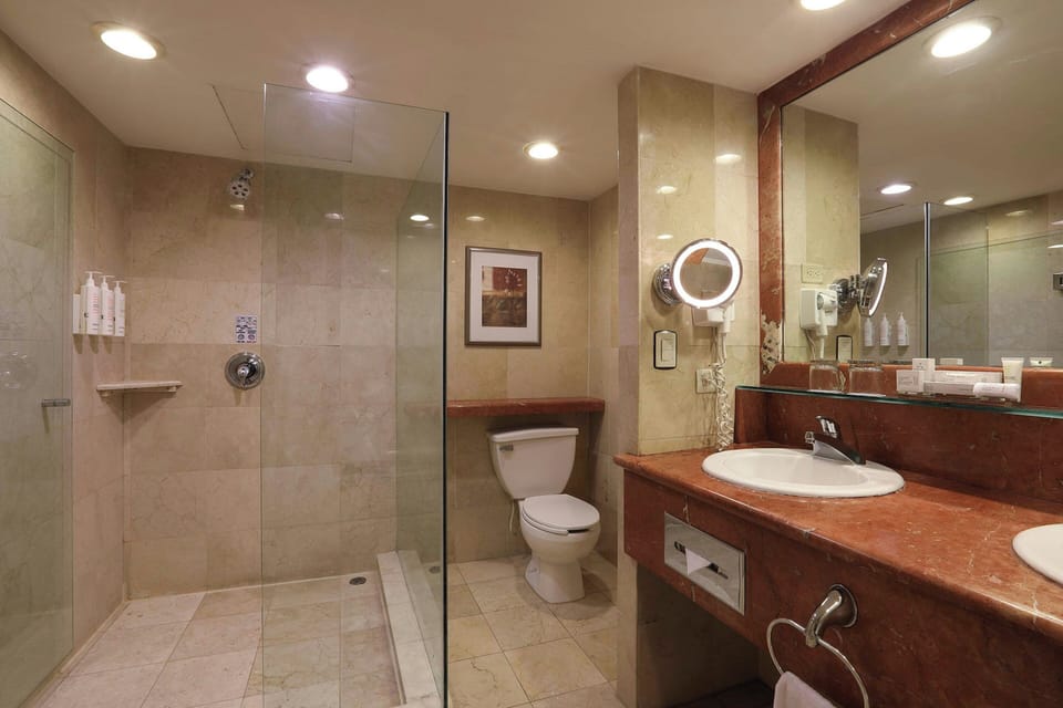 Combined shower/tub, deep soaking tub, free toiletries, hair dryer