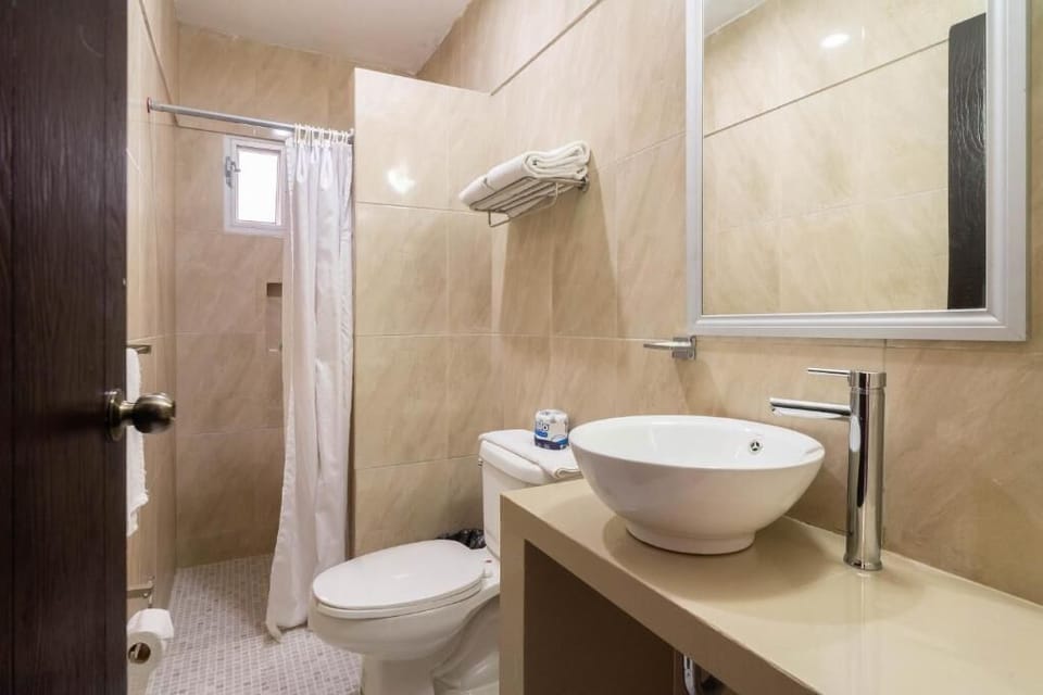 Standard Room, 2 Double Beds | Bathroom | Shower, hair dryer, towels