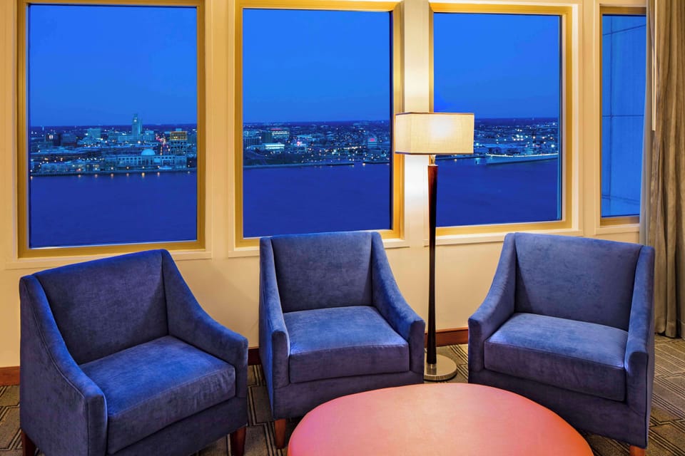 Exclusive Studio, 1 King Bed, Club Lounge Access | Living area | 65-inch flat-screen TV with cable channels, TV, iPod dock