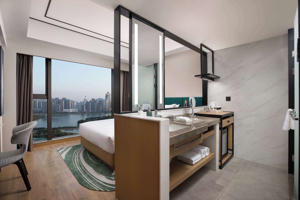 Room, 1 Queen Bed, Lake View | Bathroom | Shower, free toiletries, hair dryer, slippers