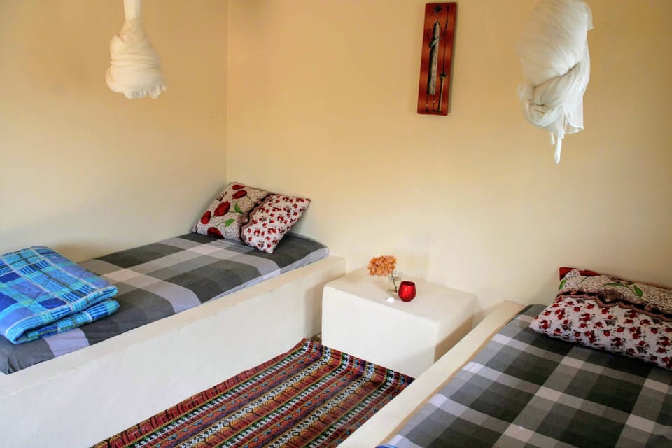 Basic Twin Room, Shared Bathroom | Blackout drapes, bed sheets