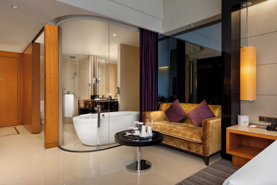 Deluxe Room, 2 Twin Beds | Bathroom | Combined shower/tub, rainfall showerhead, eco-friendly toiletries