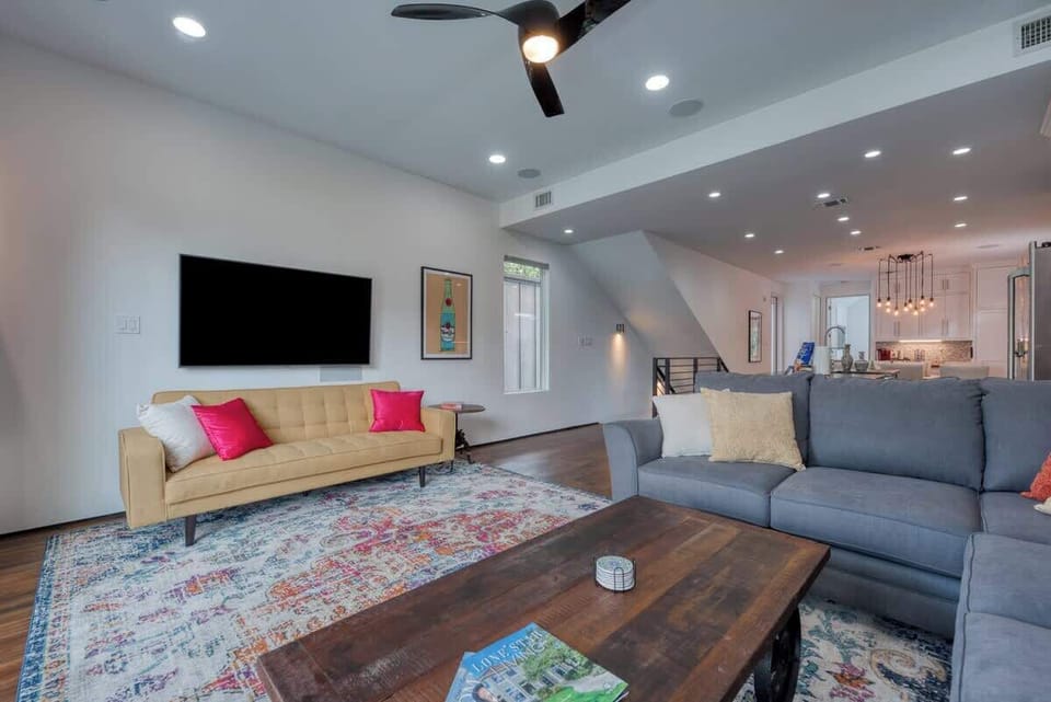 65 inch Samsung 4K UHD Smart TV - The Yellow futon sofa has been replace with a Coddle Me Luxury Queen Convertible Sofa comfortably that sleeps two adults and features sinuous springs and pocket coil mattress technology for maximum snoozeability