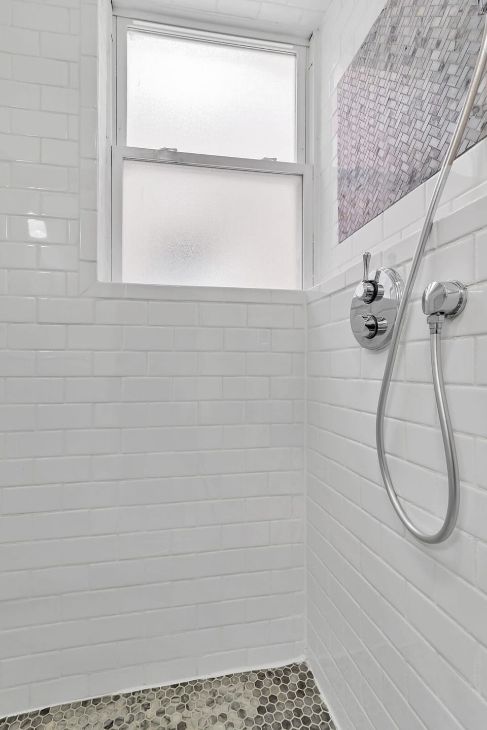 Big shower with thermostatic shower valves.