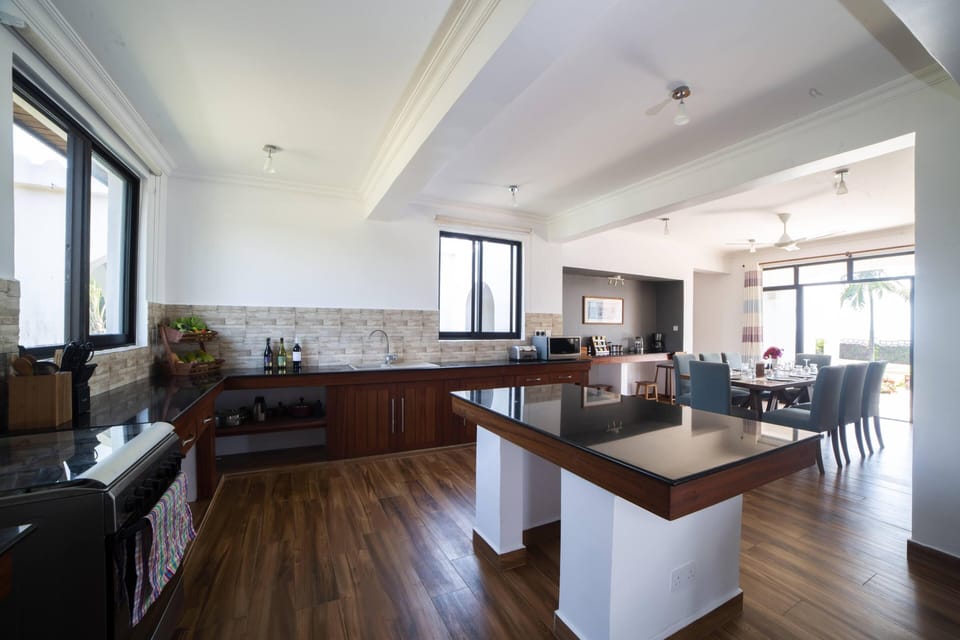 Luxury Villa | Private kitchen | Fridge, microwave, oven, stovetop