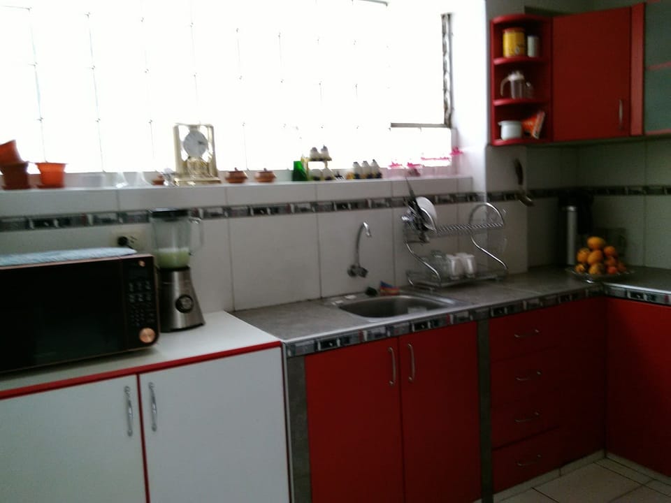 Fridge, microwave, stovetop, cookware/dishes/utensils