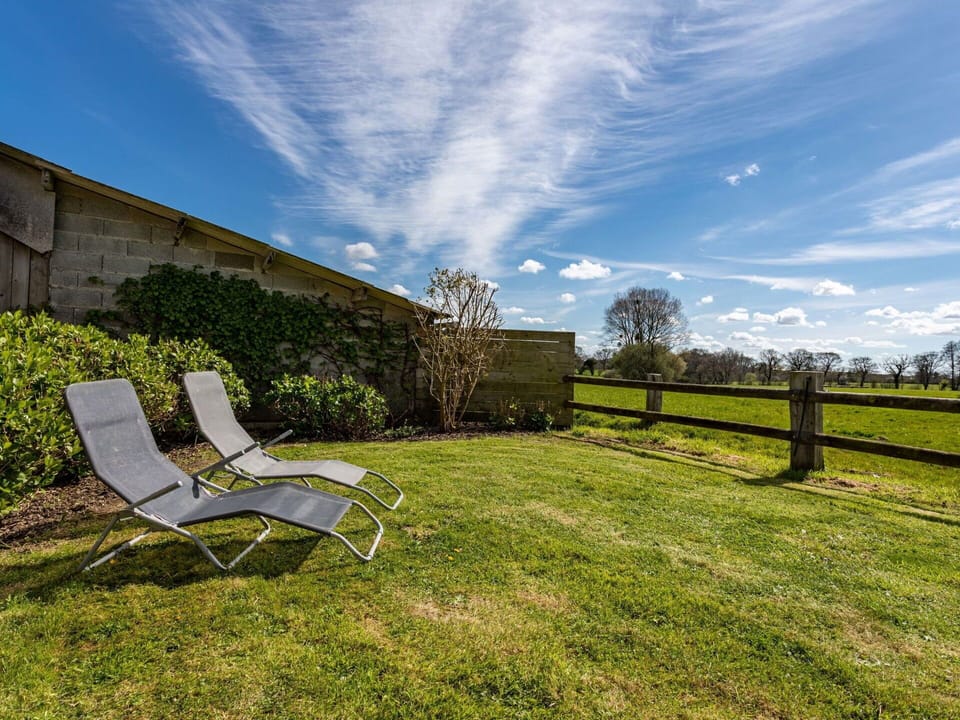 Cloud, Sky, Plant, Furniture, Ecoregion, Natural Landscape, Land Lot, Fence, Grass, Outdoor Furniture