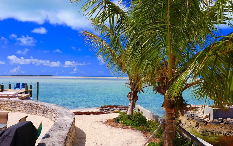 Walk down to your private beach and enjoy the perfect waters